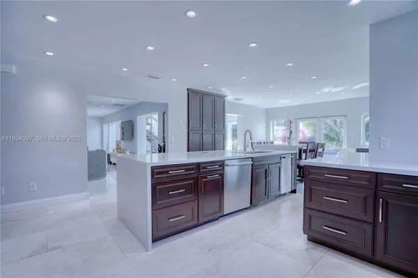 a bedroom with a large bed and a couch