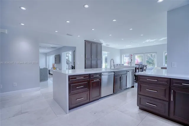 a bedroom with a large bed and a couch