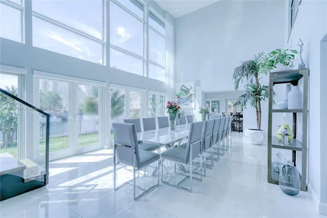 a bedroom with bed and window