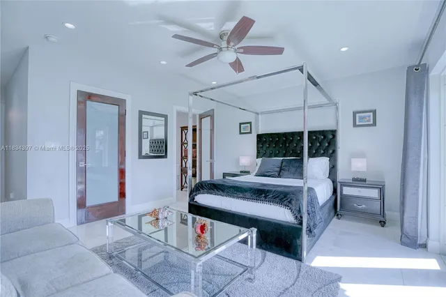 a view of walk in closet with clothes