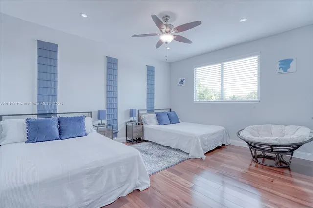 a view of a dining room with furniture and window