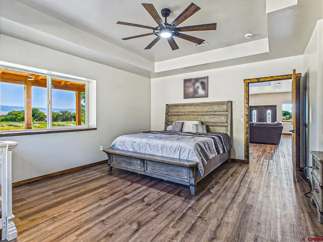 a kitchen with stainless steel appliances granite countertop a sink and wooden cabinets