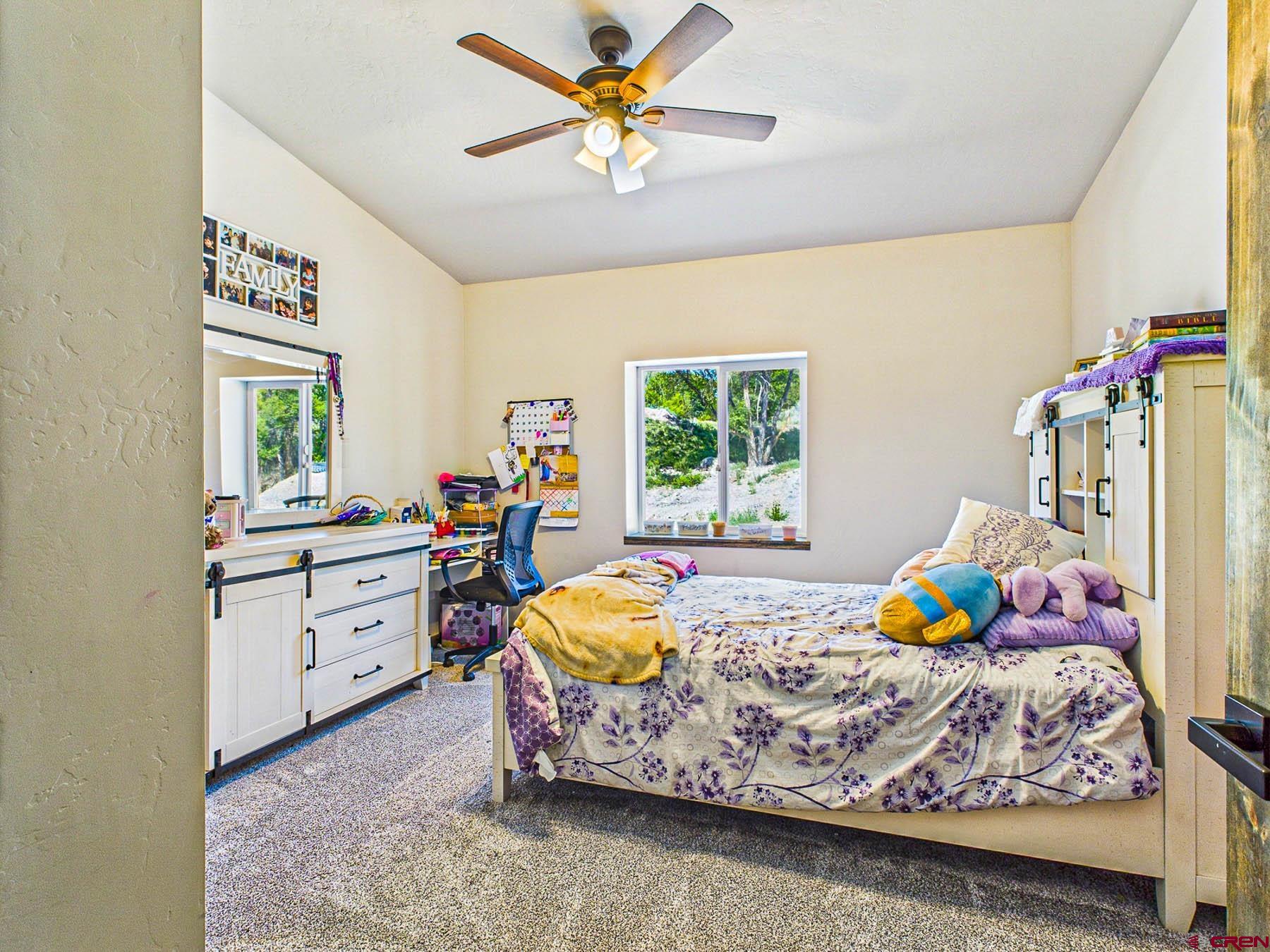 14885 G Road Delta, CO 81416 - Photo 24 of 45 a room with bed and window