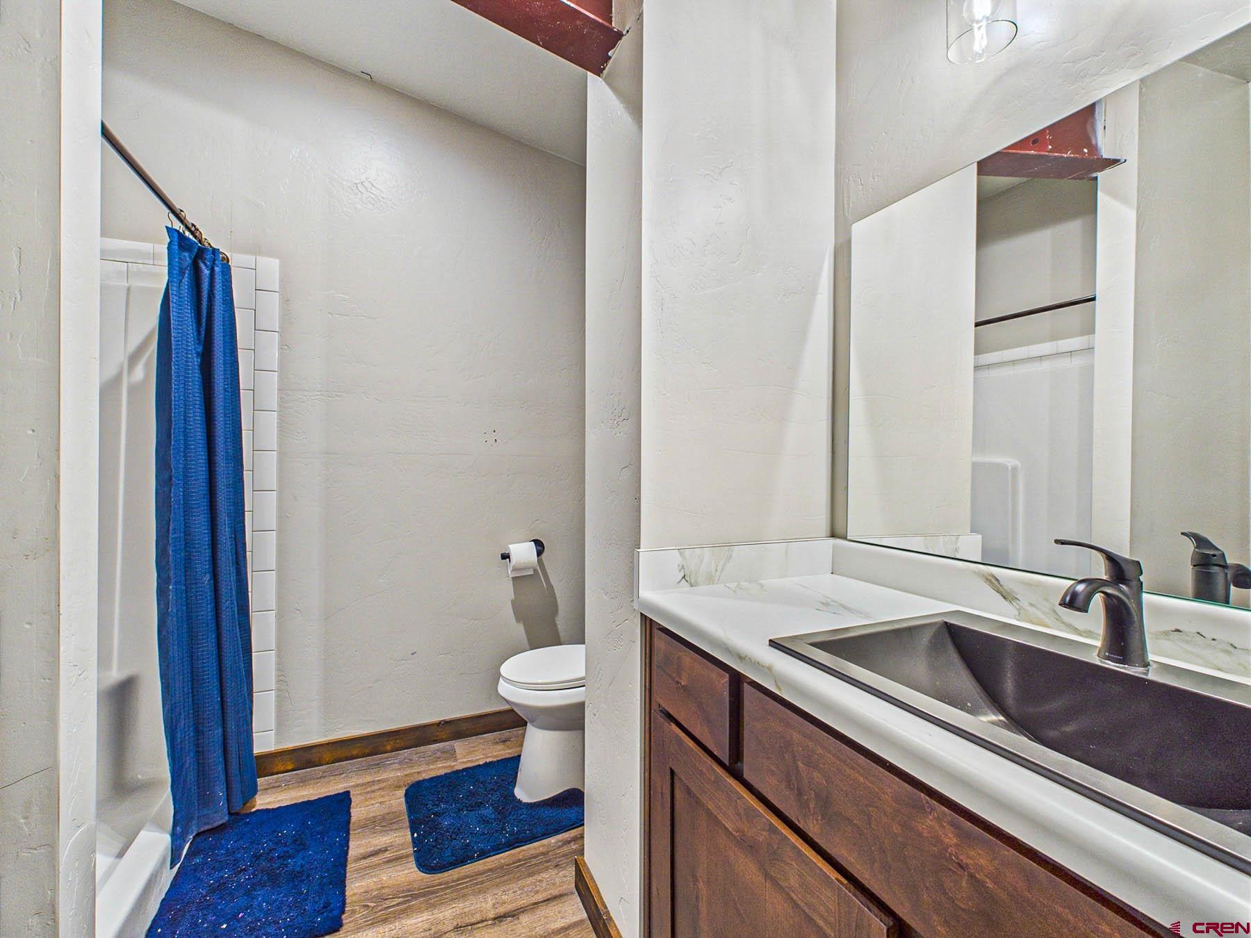 14885 G Road Delta, CO 81416 - Photo 30 of 45 a bathroom with a sink and a mirror