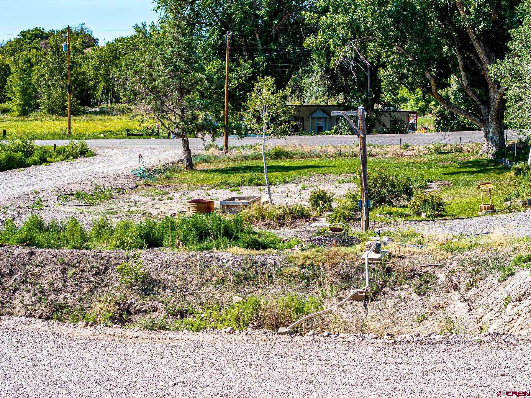 14885 G Road Delta, CO 81416 - Photo 44 of 45 a view of a garden with a slide