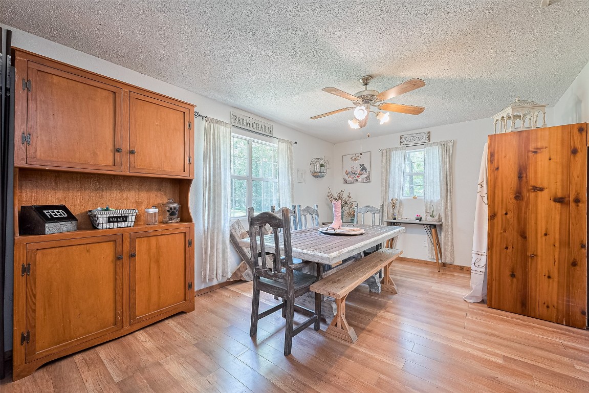 200 Little Pine Valley Road Cleveland, TX 77328 - Photo 16 of 43 a view of a kitchen with workspace and a window