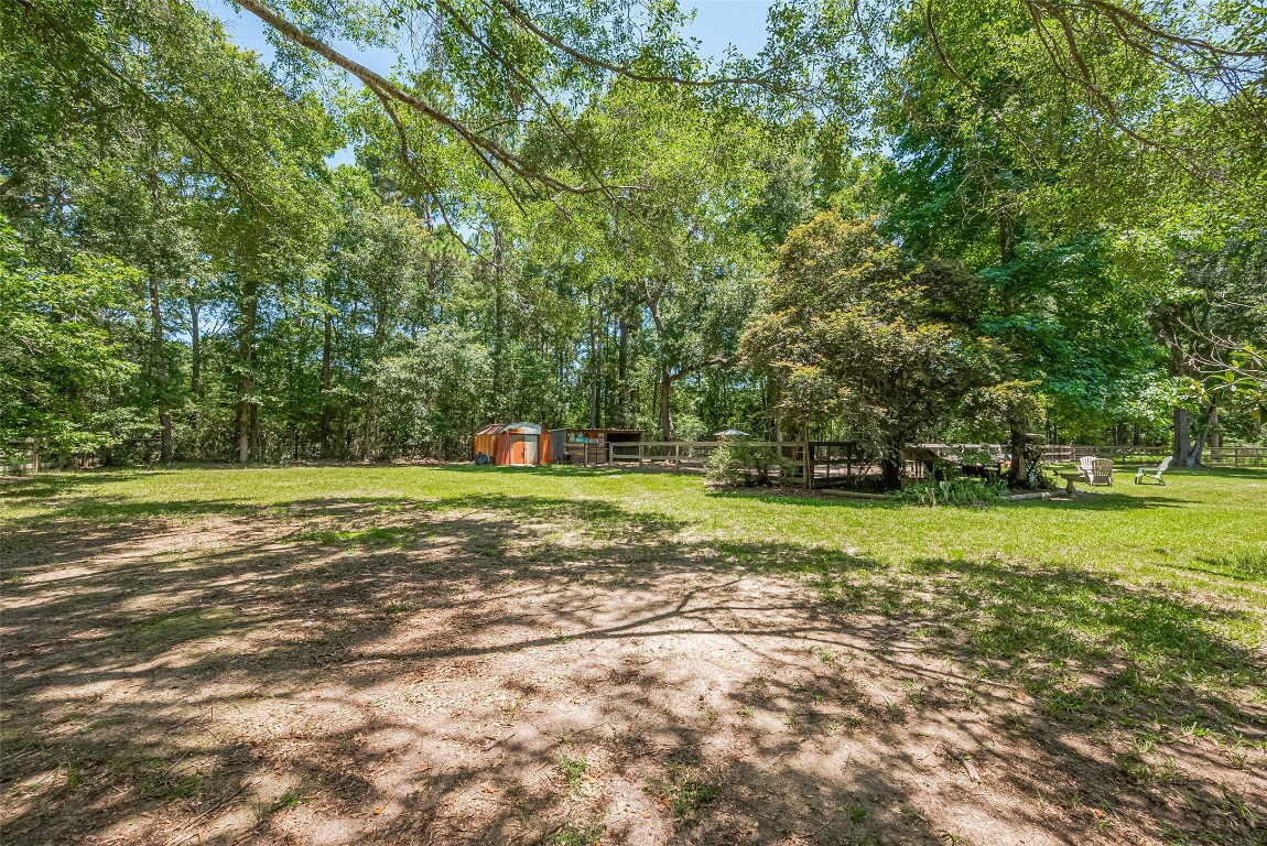 200 Little Pine Valley Road Cleveland, TX 77328 - Photo 2 of 43 a view of a park with large trees