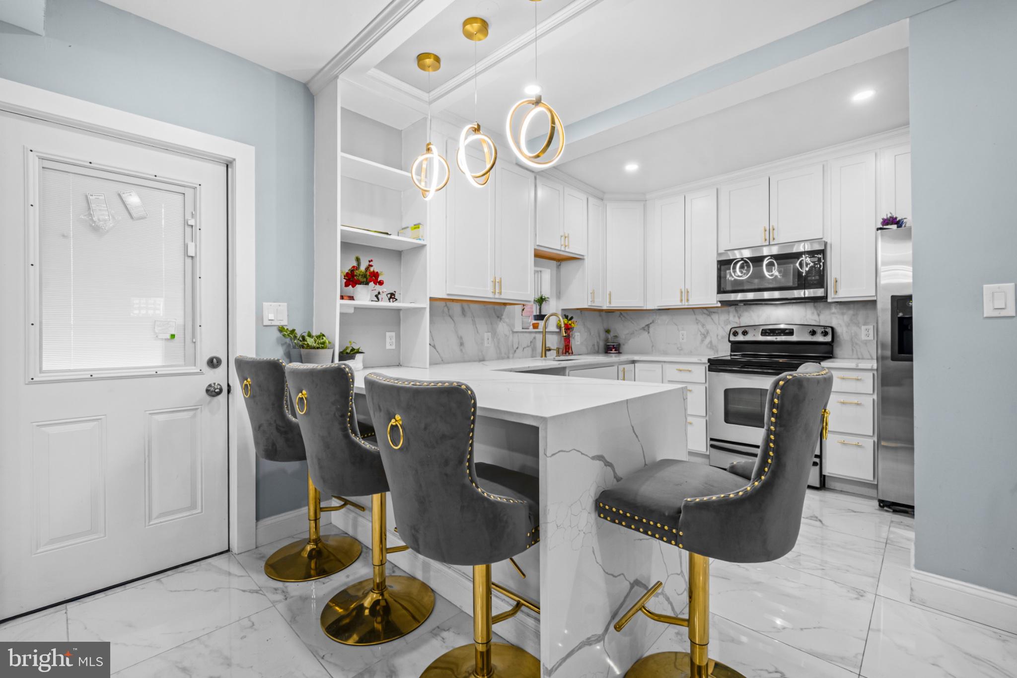 46 Boone Street Cumberland, MD 21502 - Photo 5 of 35 Sleek kitchen with modern elegance.