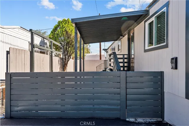 a view of a porch with a bench