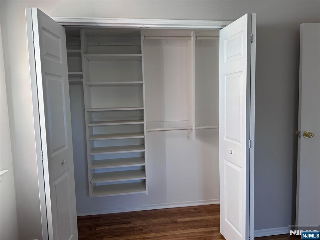 1165 A Valley Road, Unit 1165A Wayne, NJ 07470 - Photo 17 of 22 a view of walk in closet with empty racks