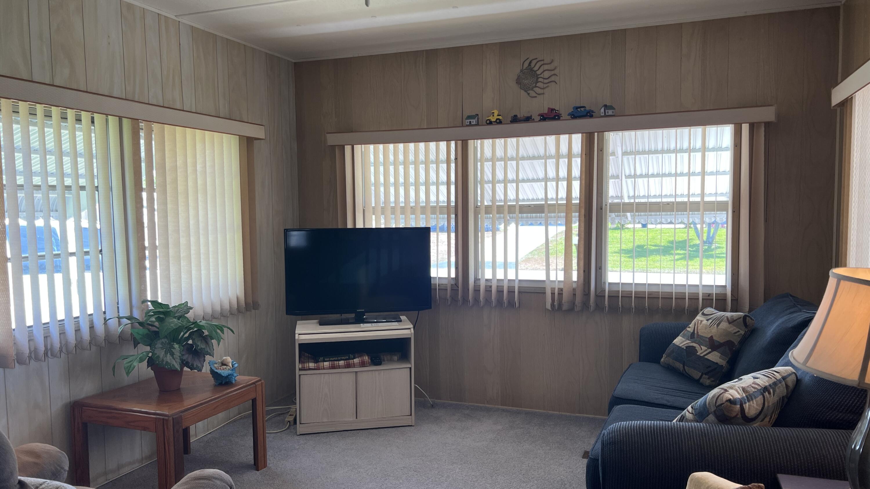 7029 Southeast Ridgeway Terrace Hobe Sound, FL 33455 - Photo 3 of 39 IMG_E4823