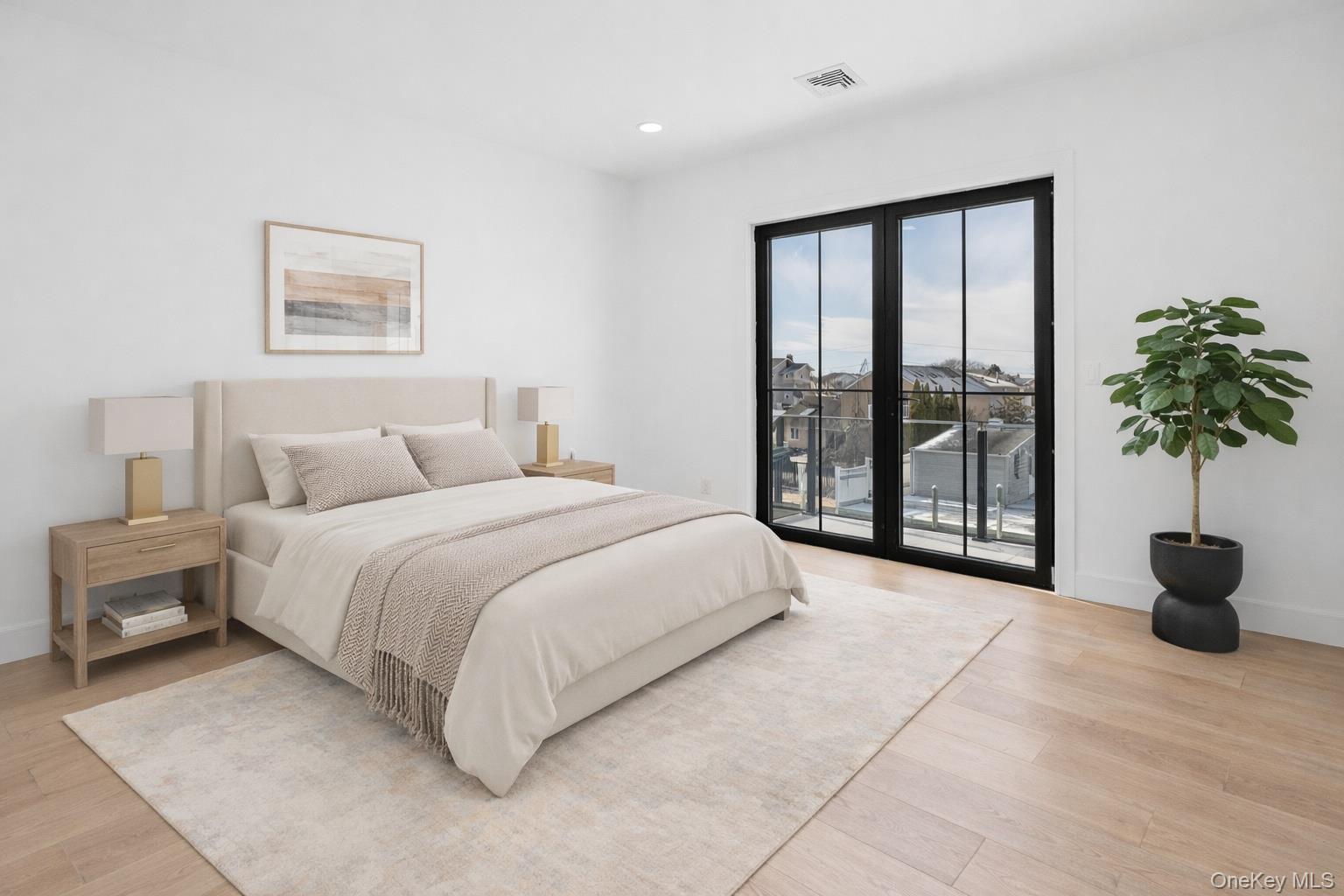 24 Midway Street Babylon, NY 11702 - Photo 23 of 40 Bedroom with access to outside, light wood-type flooring, and recessed lighting