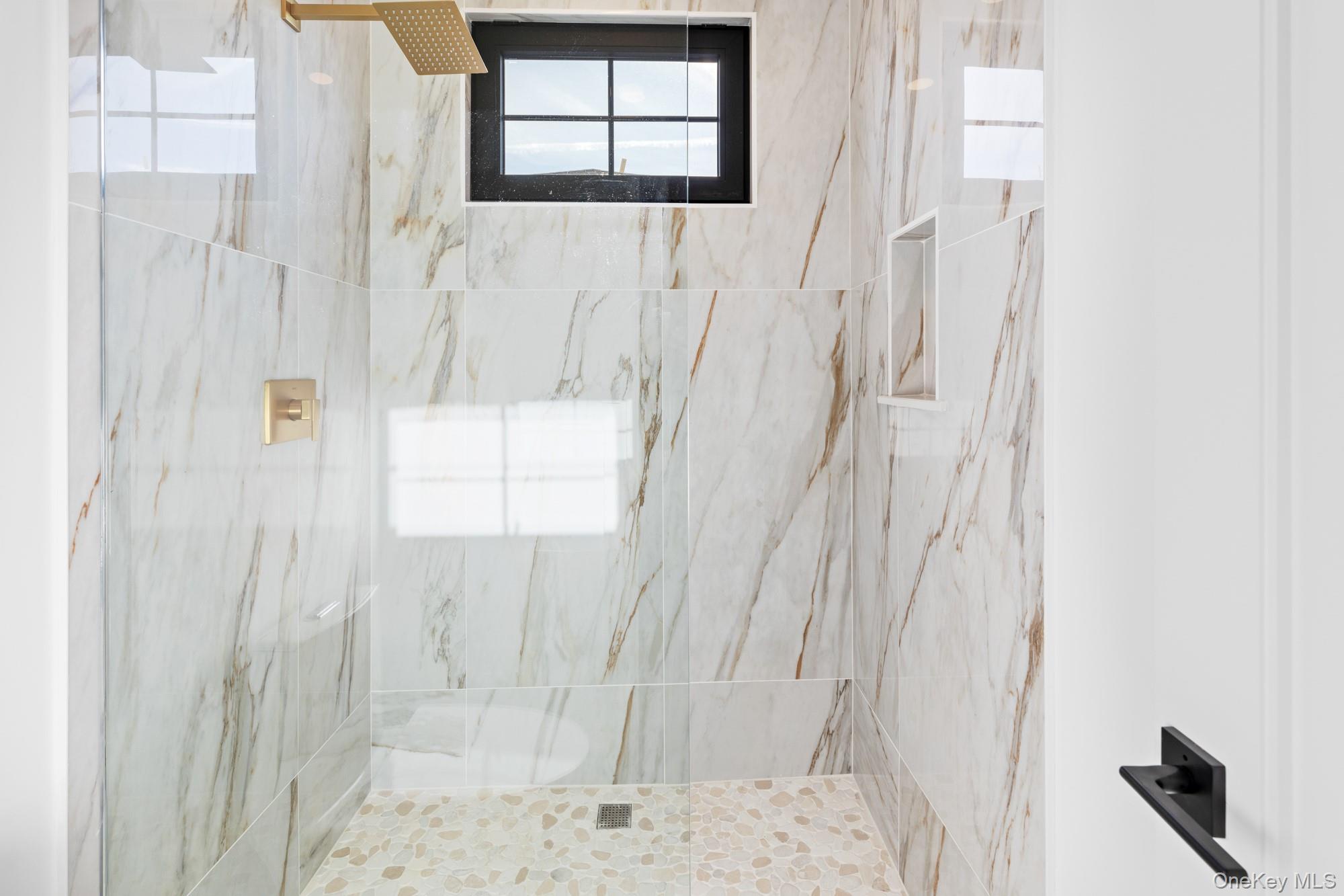 24 Midway Street Babylon, NY 11702 - Photo 25 of 40 Bathroom with a marble finish shower