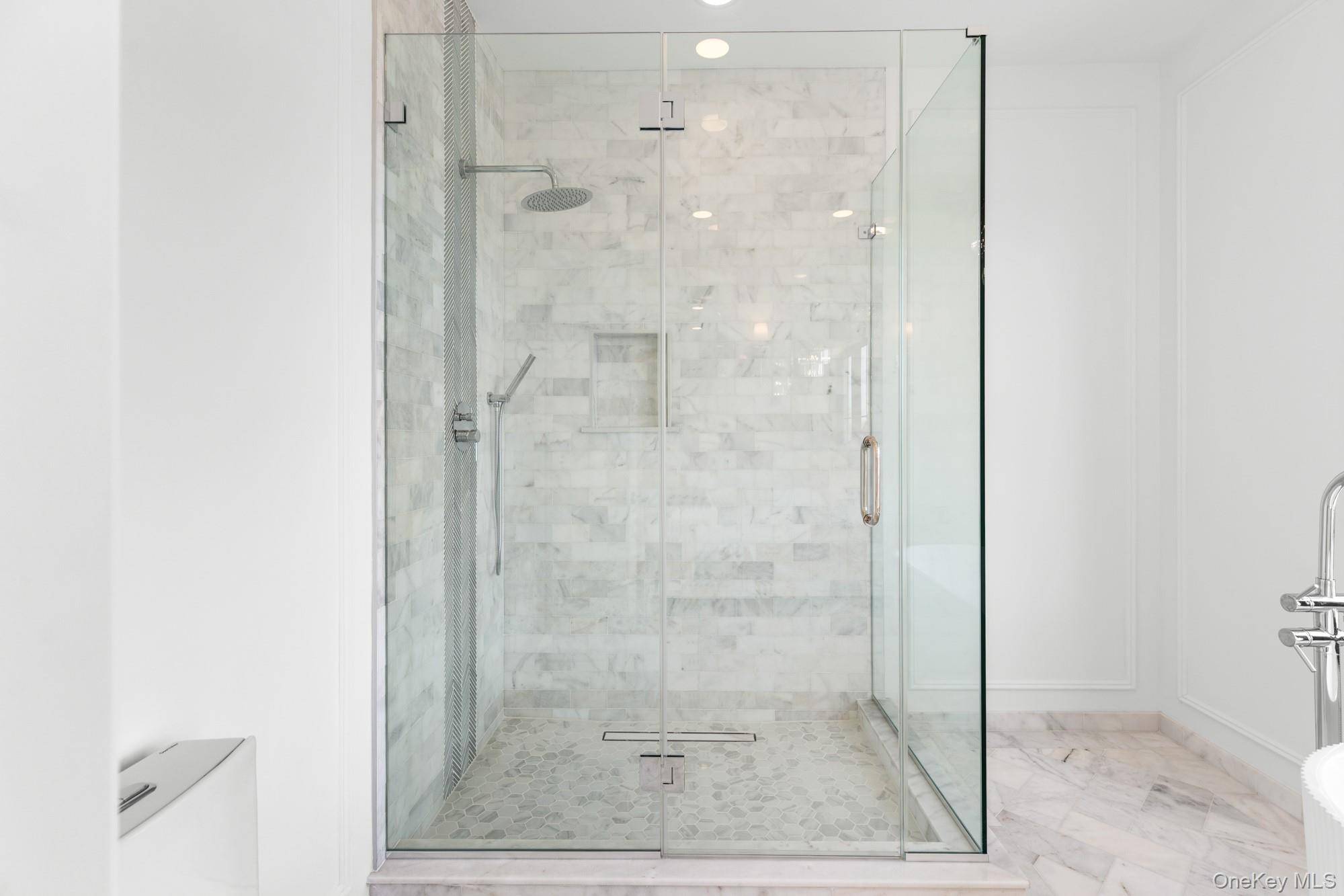 24 Midway Street Babylon, NY 11702 - Photo 36 of 40 Full bathroom featuring a shower stall and a freestanding bath