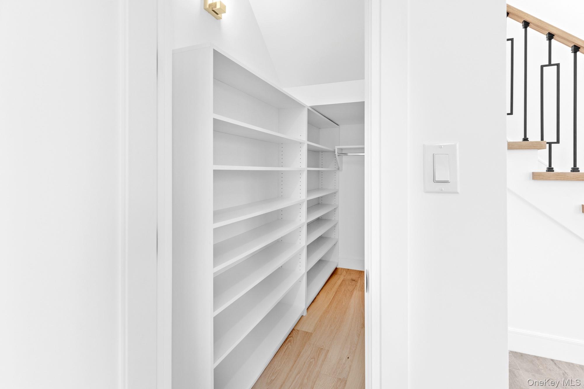 24 Midway Street Babylon, NY 11702 - Photo 9 of 40 Spacious closet with light wood-type flooring