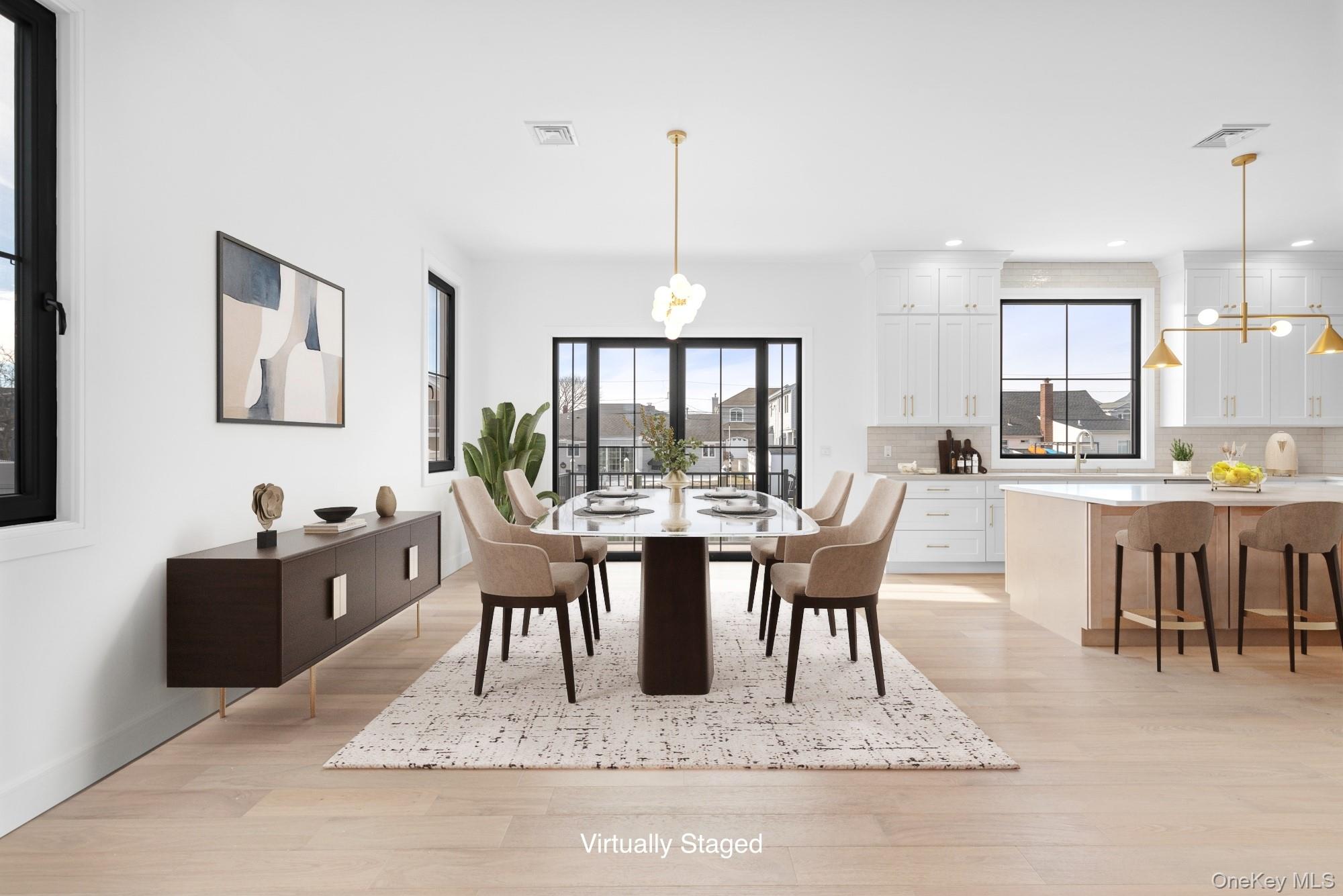 24 Midway Street Babylon, NY 11702 - Photo 10 of 40 Dining space featuring light wood-style flooring, a chandelier, and recessed lighting