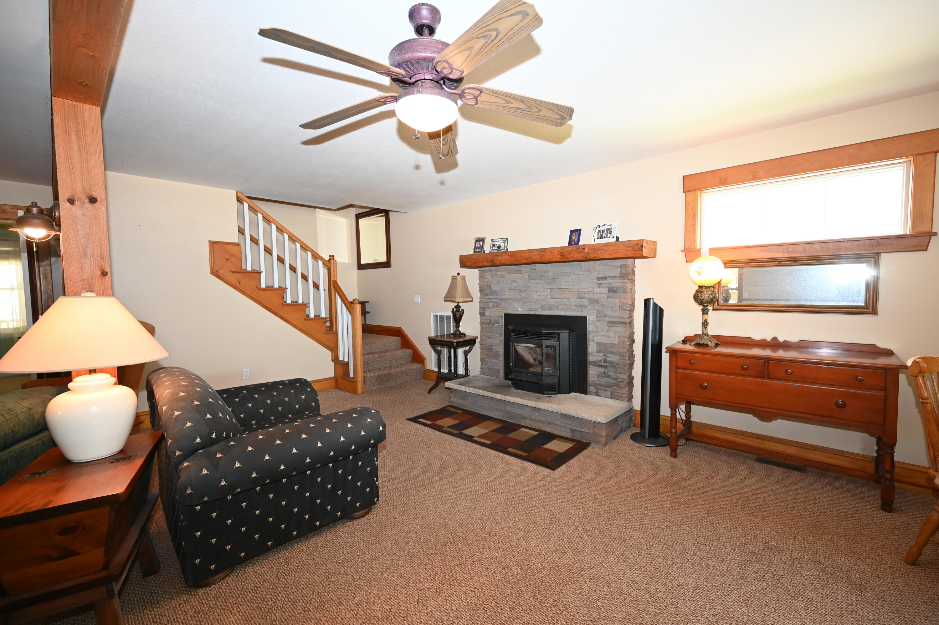 78 Sebago Road Sebago, ME 04029 - Photo 19 of 52 Living Room with pellet stove