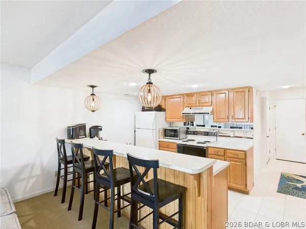 $234,900 | 24 Sunrise Ridge Drive, Unit 213, Sunrise Beach, MO 65079