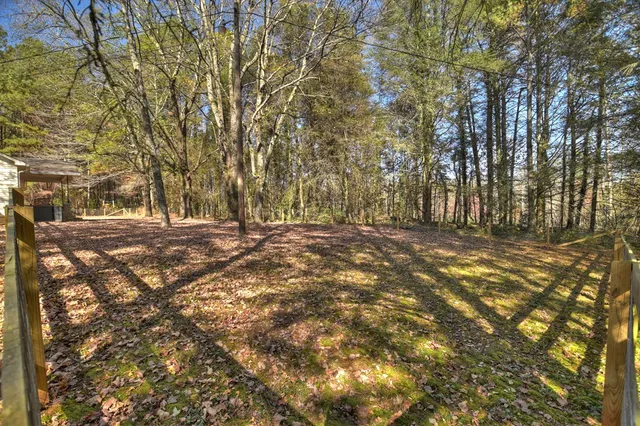 a view of road with trees