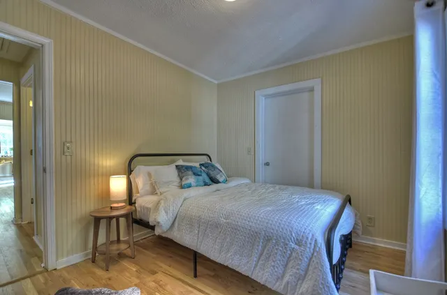 a kitchen with granite countertop a sink stainless steel appliances a counter space and cabinets