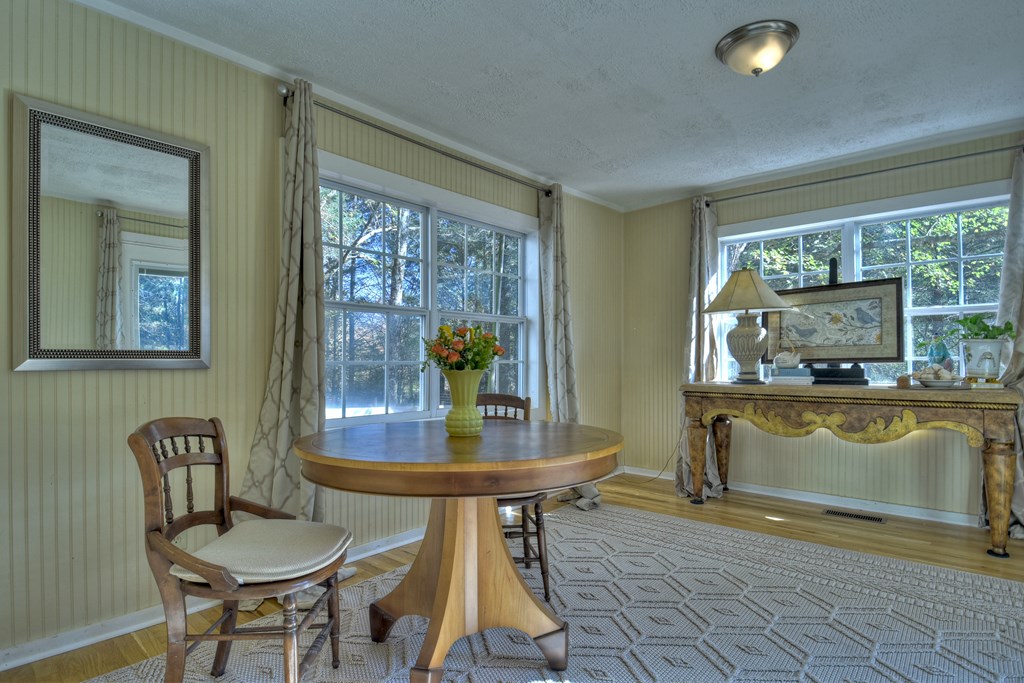 3380 Clear Creek Road Ellijay, GA 30536 - Photo 37 of 39 a view of a dining room with furniture and window