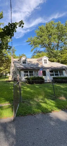 a view of a yard with an outdoor space