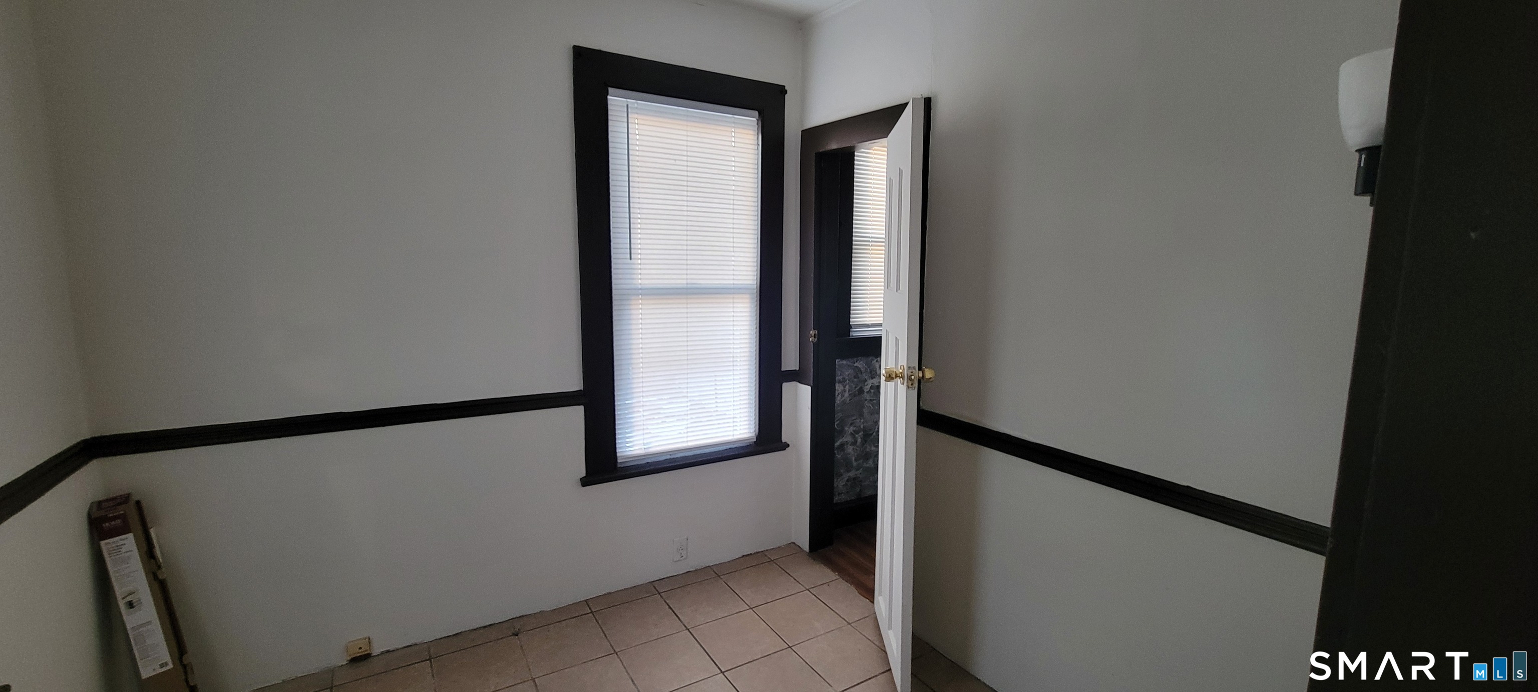130 Church Street Bristol, CT 06010 - Photo 9 of 22 a view of walk in closet with window