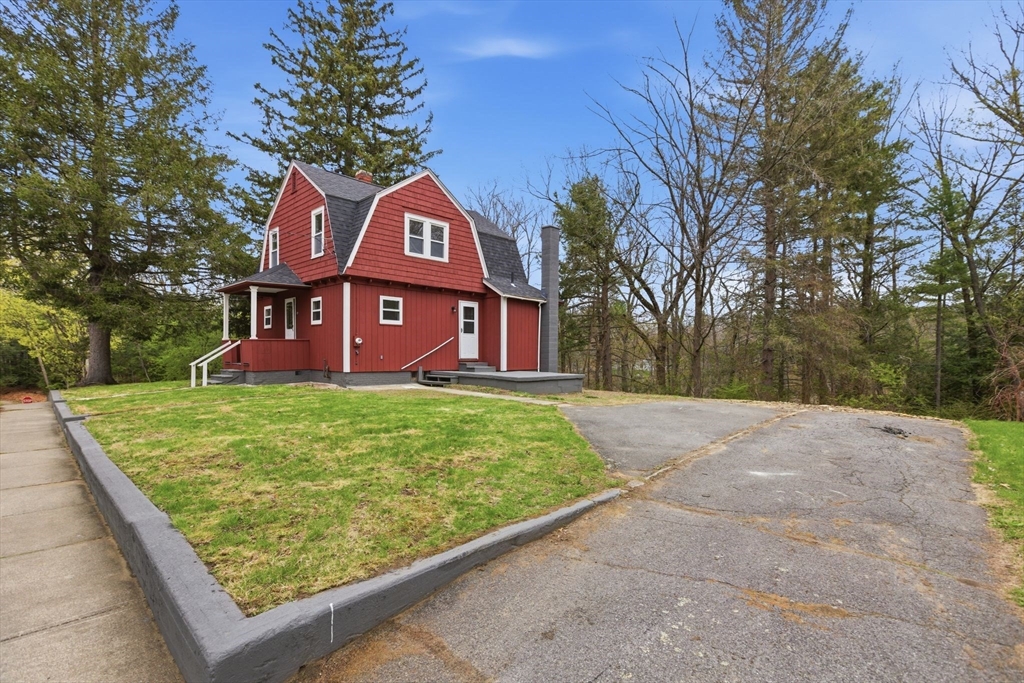 17 West High Street Erving, MA 01344 - Photo 11 of 12 a front view of a house with garden
