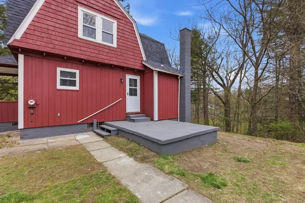 a view of backyard with trampoline