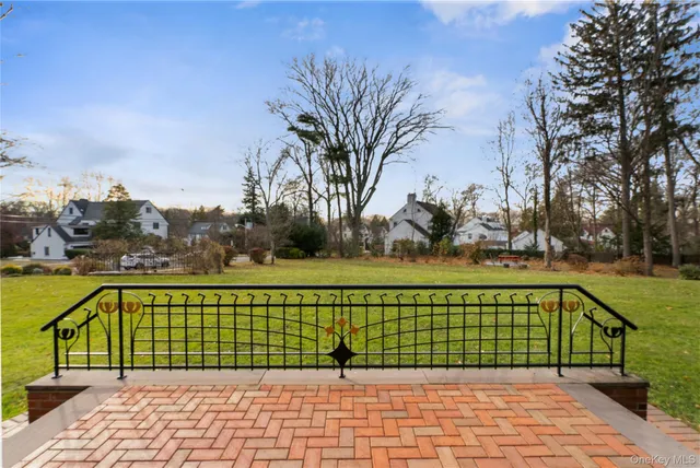 a view of a park with large trees