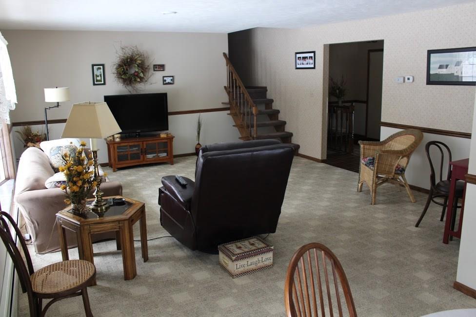 2424 Rutledge Road Transfer, PA 16154 - Photo 4 of 25 The living room/dining room welcomes you when you enter the home