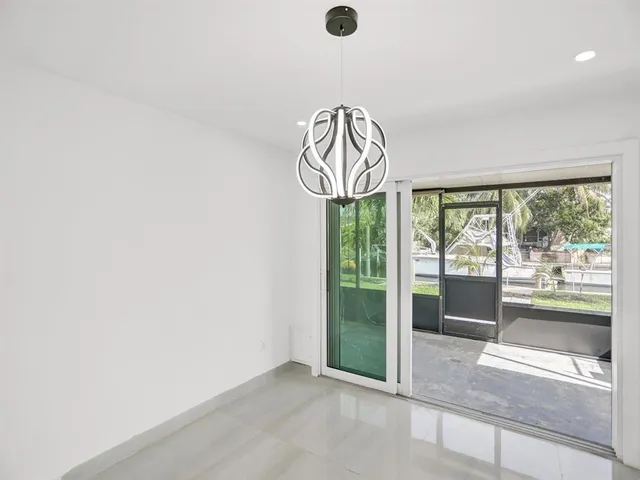 a view of living room with furniture and garden view