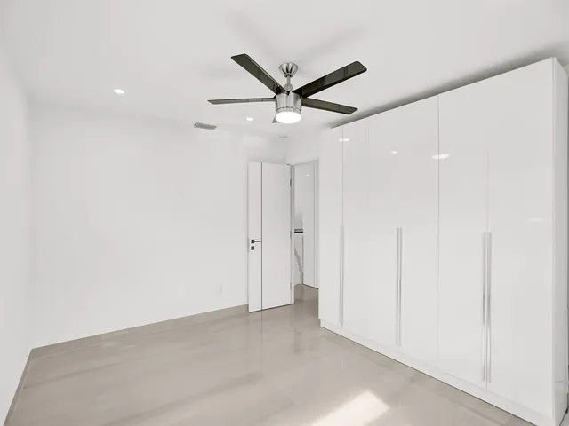 a view of a ceiling fan in a room