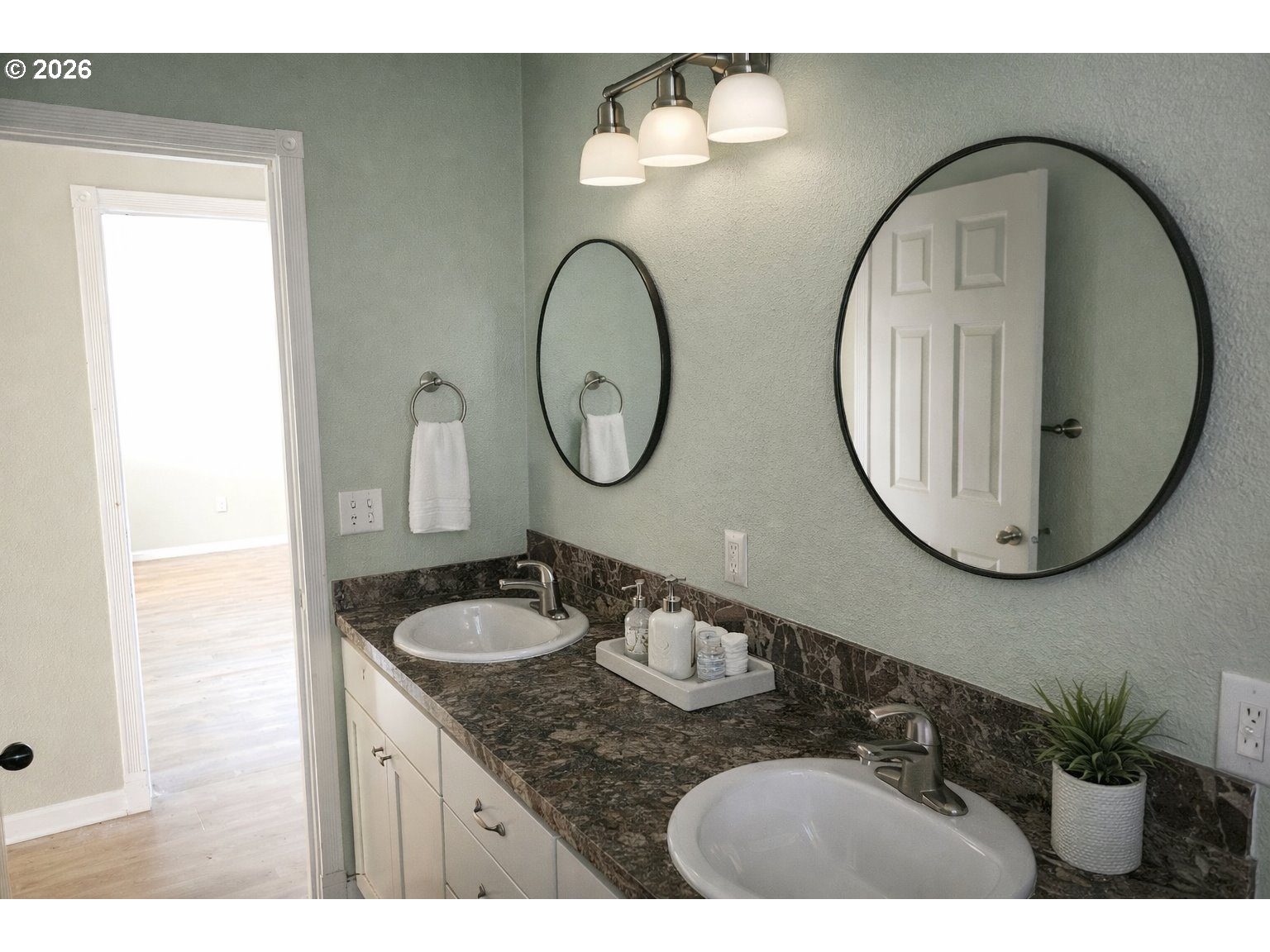 183 East Dodge Street Lebanon, OR 97355 - Photo 19 of 21 a bathroom with a granite countertop double vanity sink and a mirror