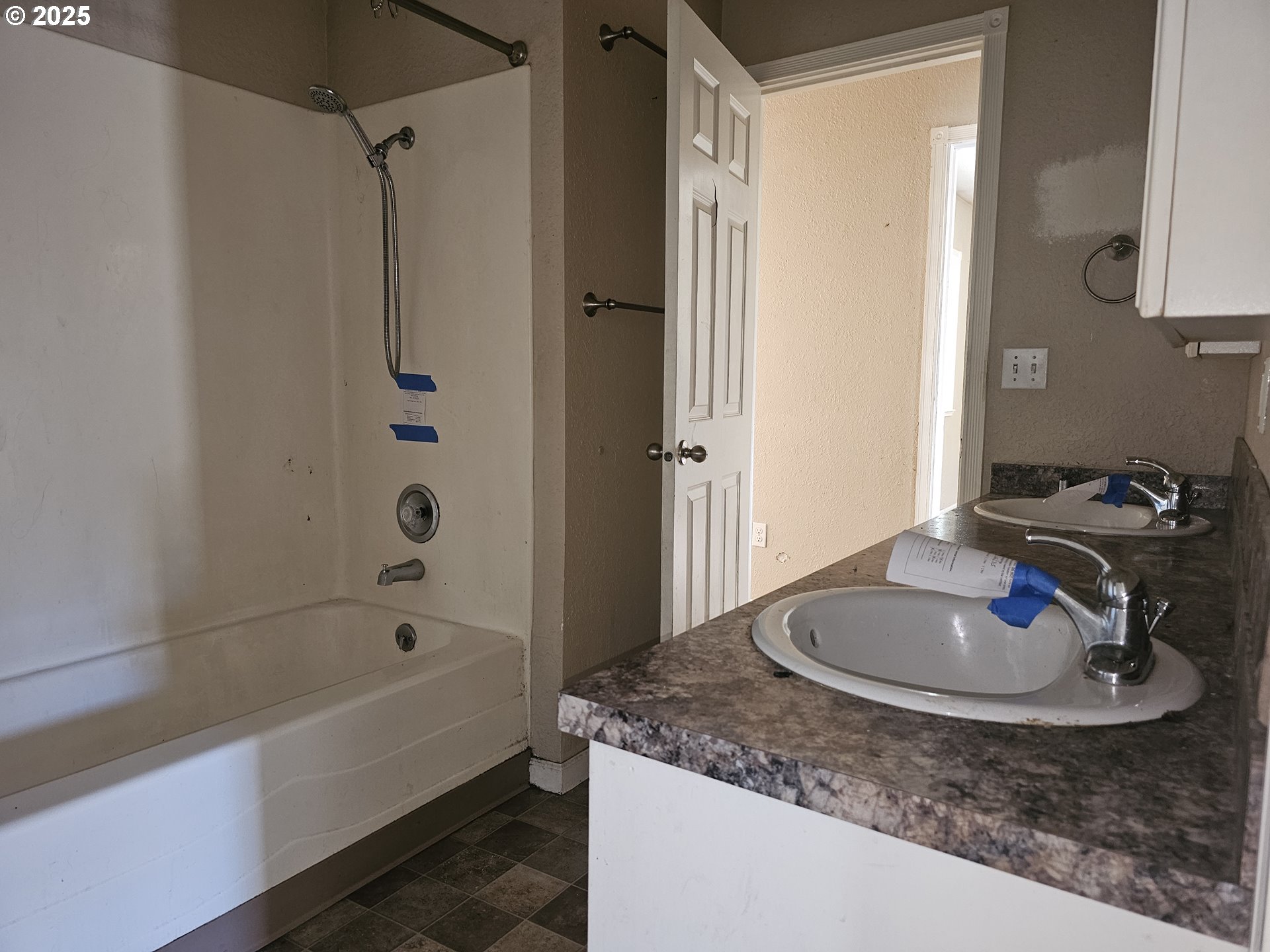183 East Dodge Street Lebanon, OR 97355 - Photo 8 of 21 a bathroom with a granite countertop sink and a mirror