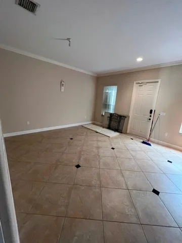 a view of a room with an empty space