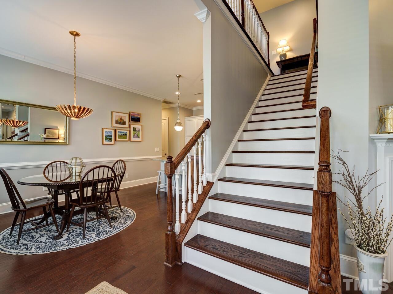 500 Deodar Lane Raleigh, NC 27608 - Photo 3 of 49 a view of a dining room with furniture and wooden floor