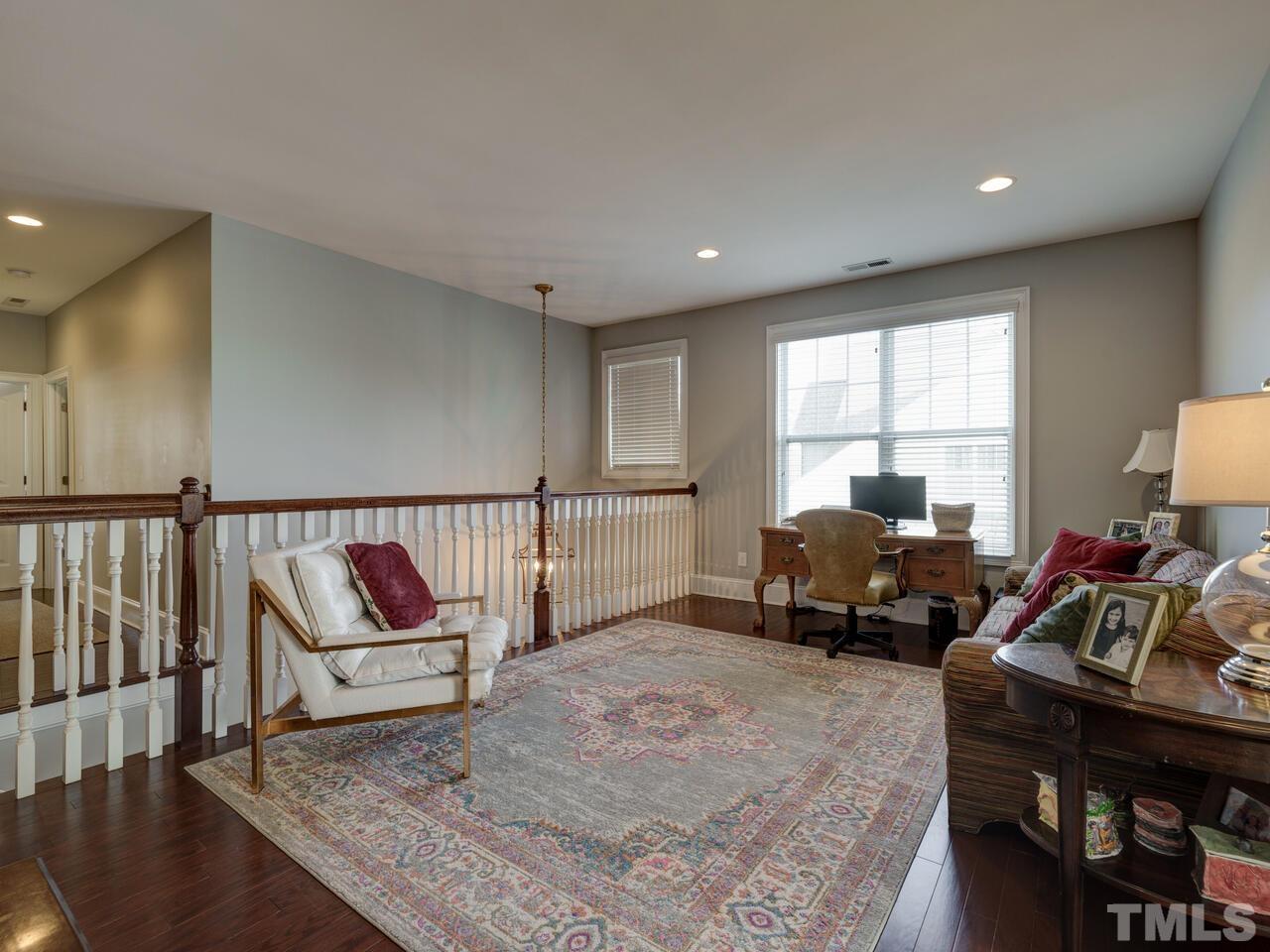 500 Deodar Lane Raleigh, NC 27608 - Photo 31 of 49 a bed room with furniture and a window