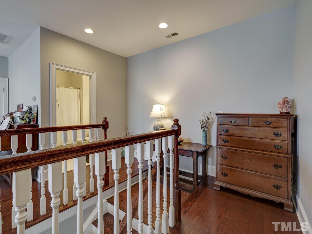 500 Deodar Lane Raleigh, NC 27608 - Photo 35 of 49 a view of a hallway with windows