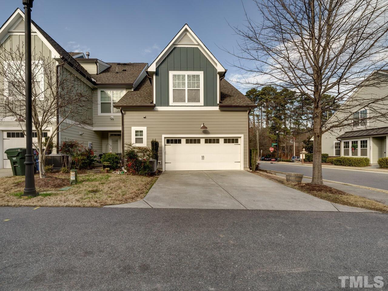 500 Deodar Lane Raleigh, NC 27608 - Photo 47 of 49 a view of residential houses with snow on the road