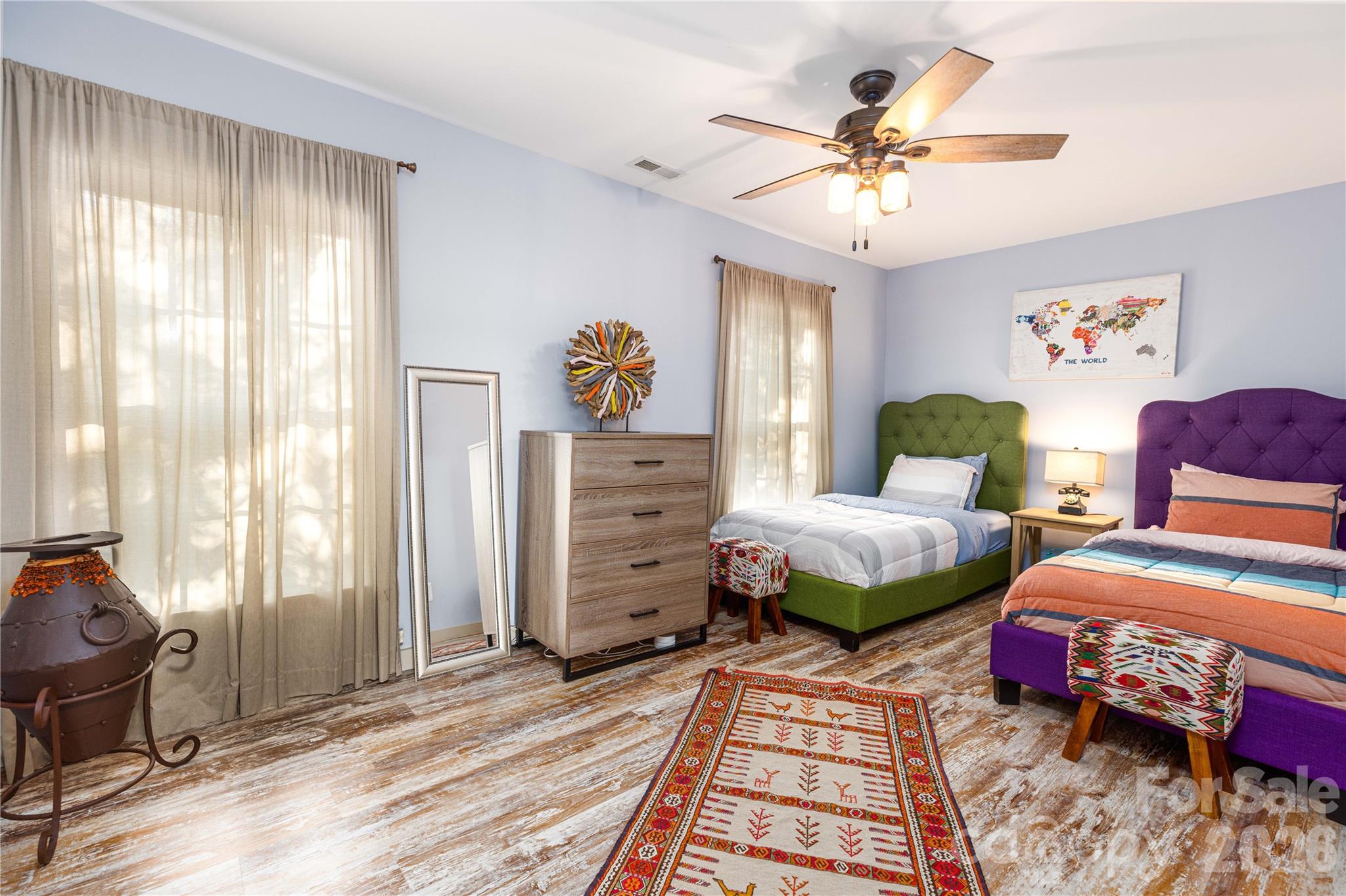221 Pineville-Matthews Road Matthews, NC 28105 - Photo 14 of 29 a bedroom with two beds and a window