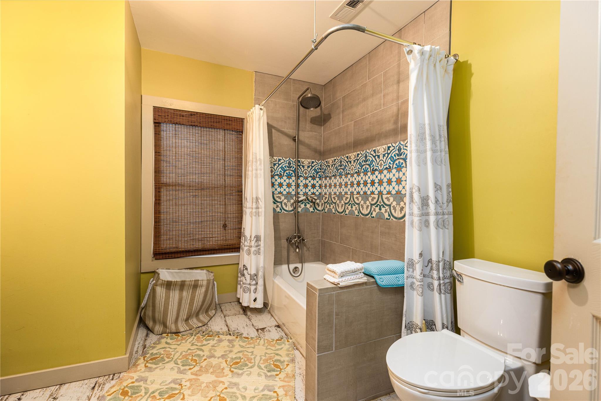 221 Pineville-Matthews Road Matthews, NC 28105 - Photo 16 of 29 a bathroom with a toilet and shower