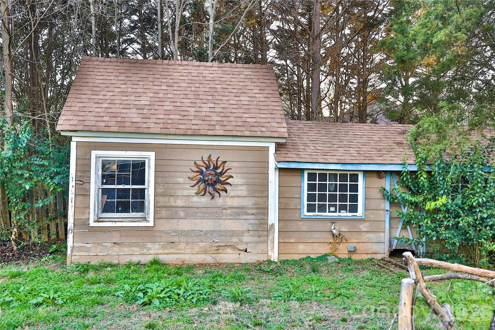 221 Pineville-Matthews Road Matthews, NC 28105 - Photo 26 of 29 a front view of a house with a yard