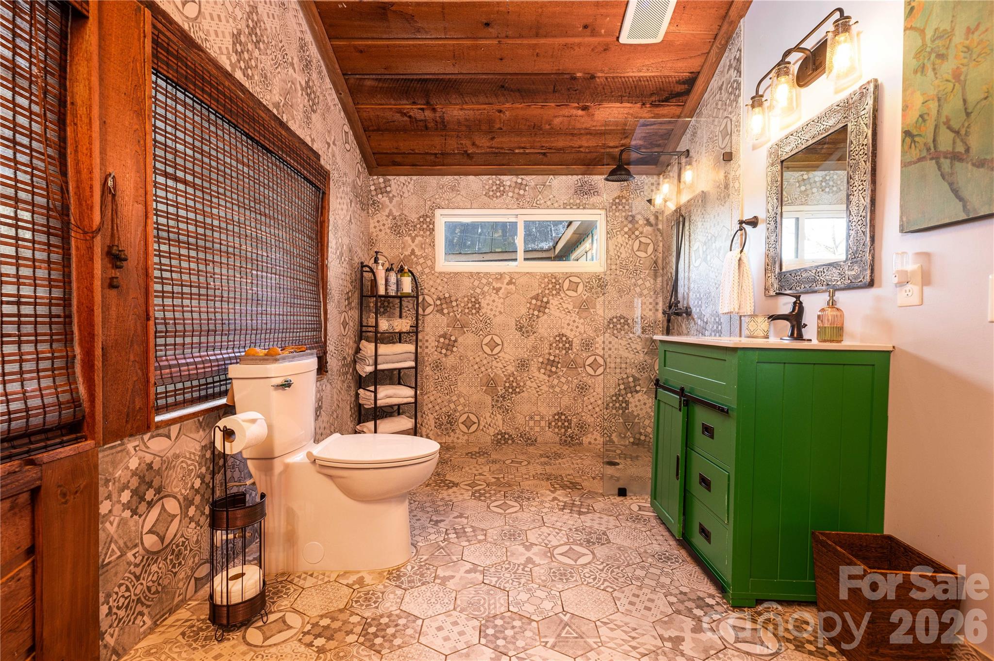 221 Pineville-Matthews Road Matthews, NC 28105 - Photo 4 of 29 a bathroom with a toilet and a sink