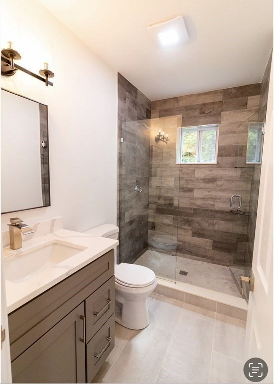 171 Hamilton Street Saugus, MA 01906 - Photo 17 of 42 a bathroom with a sink a toilet and shower