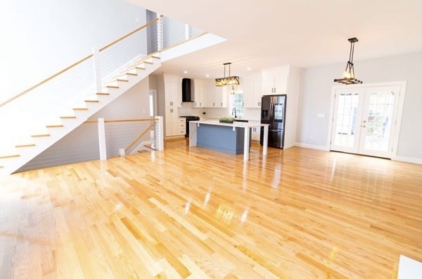 171 Hamilton Street Saugus, MA 01906 - Photo 2 of 42 a living room with furniture and kitchen view