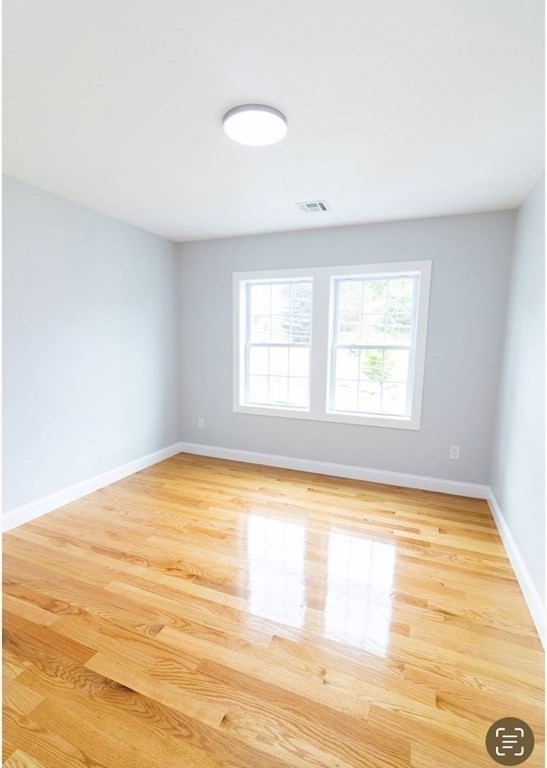 171 Hamilton Street Saugus, MA 01906 - Photo 30 of 42 a view of empty room with window and a ceiling fan