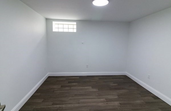 171 Hamilton Street Saugus, MA 01906 - Photo 37 of 42 a view of a small space with wooden floor and a window