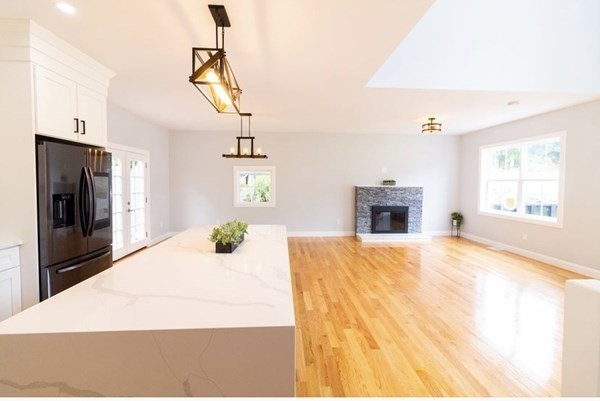 171 Hamilton Street Saugus, MA 01906 - Photo 6 of 42 a bedroom with a bed and a flat screen tv