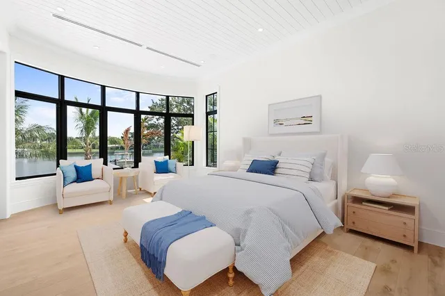 a bed room with a bed and a couch